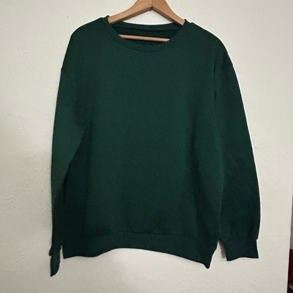 Green spine print sweater